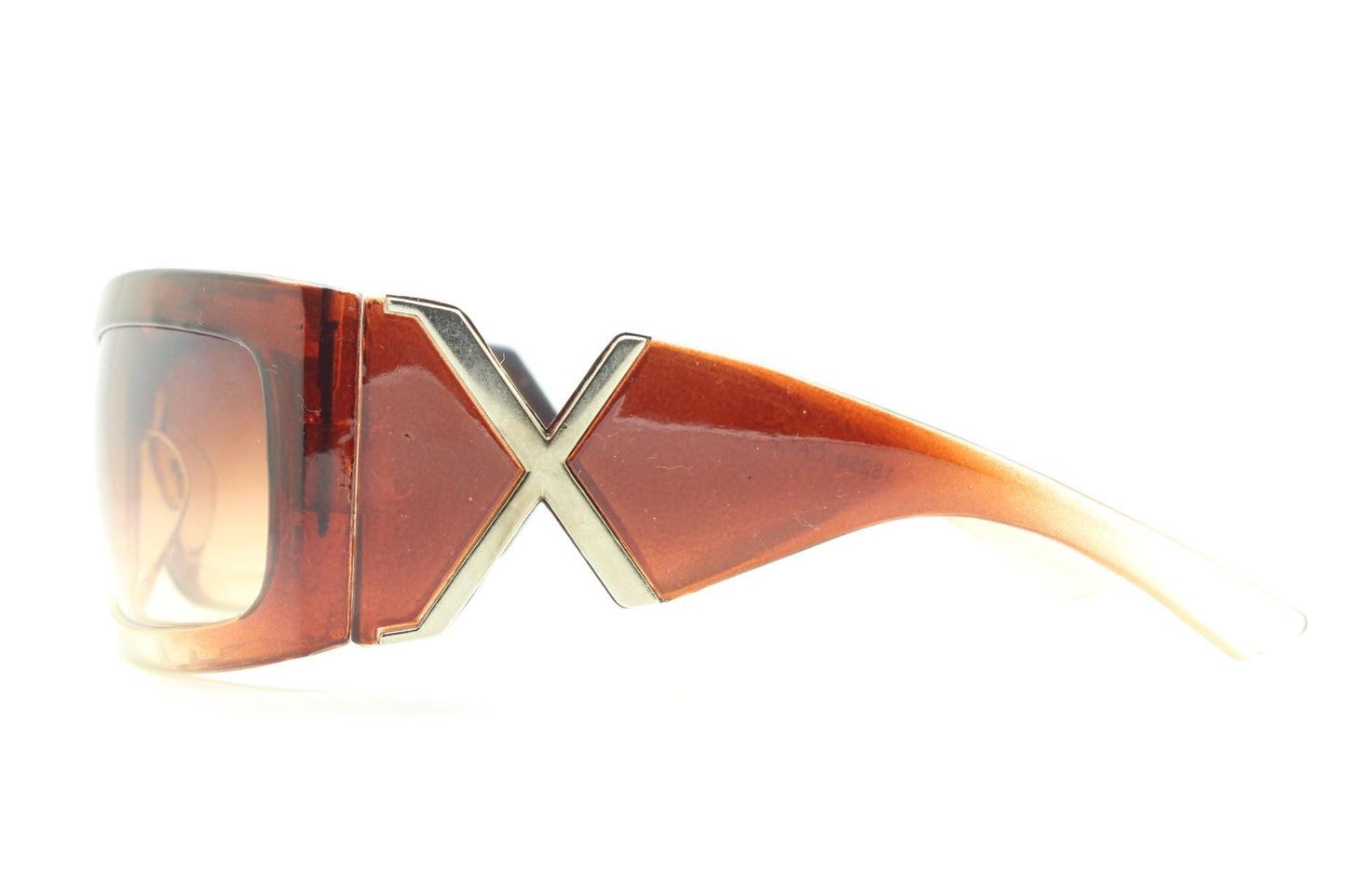 Y2K vintage big wrap around sunglasses. Transparent brown shield design with hot graduating lenses and big X crest. 2000s bug eye. NOS