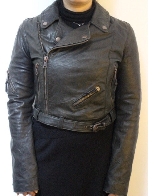 Diesel black fitted womens motorcycle jacket. Genuine leather cropped biker design with fixed adjustable belt. Over 30% sale rrp 469 GBP