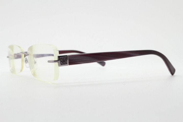 Givenchy rectangular frameless eye glasses made in Italy. Minimal optical frame with marbled brown arms. Prescription RX spectacles. Vintage