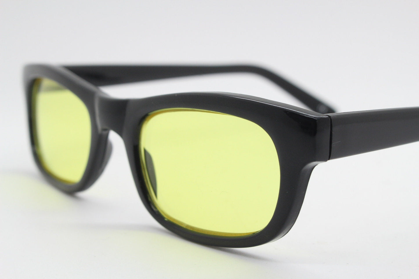 80s vintage rectangular sunglasses. Low profile slim black frame with psychedelic mod light tone canary yellow lenses. BNWT. NOS