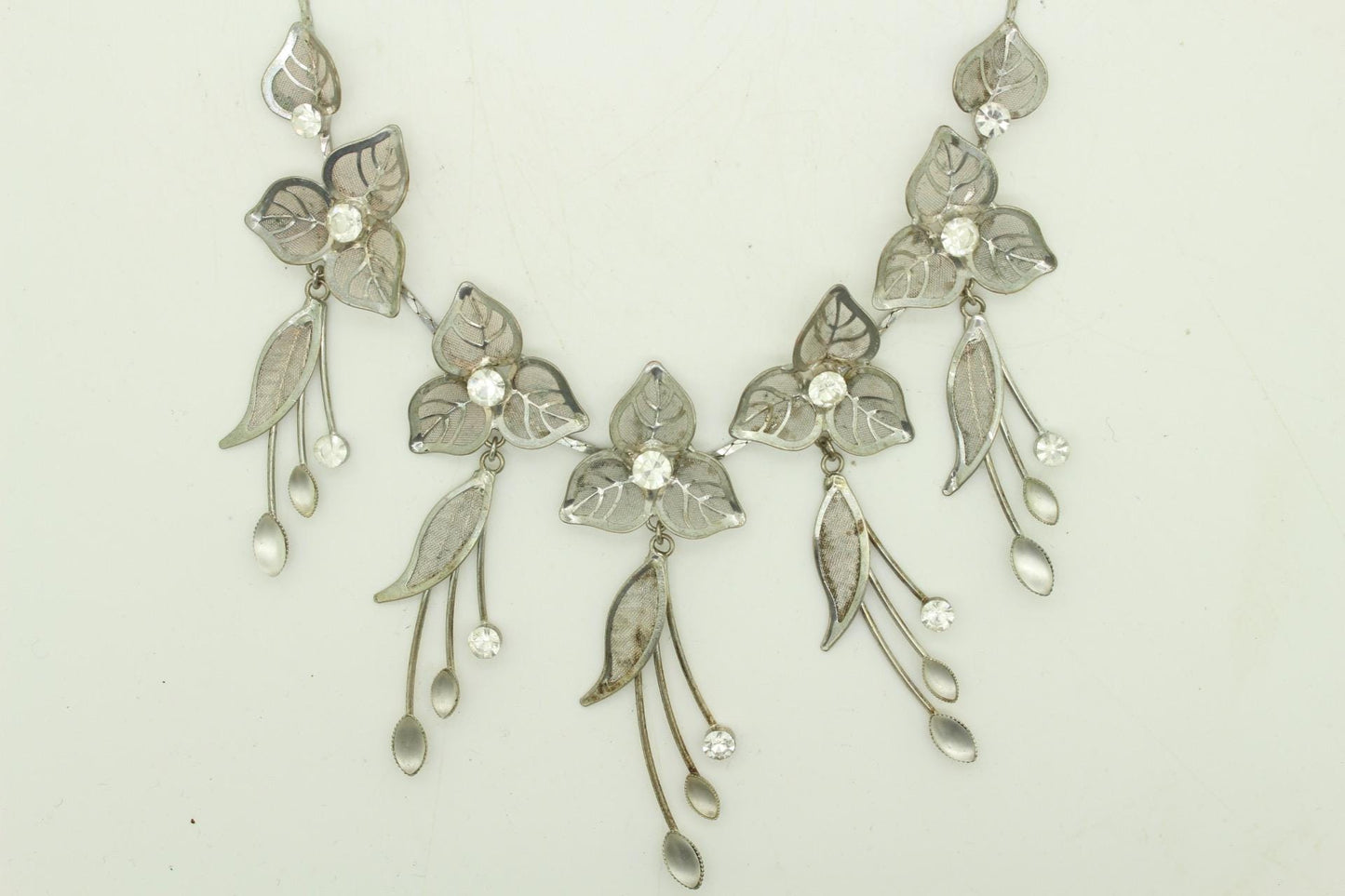 90s vintage extensive statement flower chain necklace. Full breasted array of mesh backed petals and dangling leaves with diamante centres