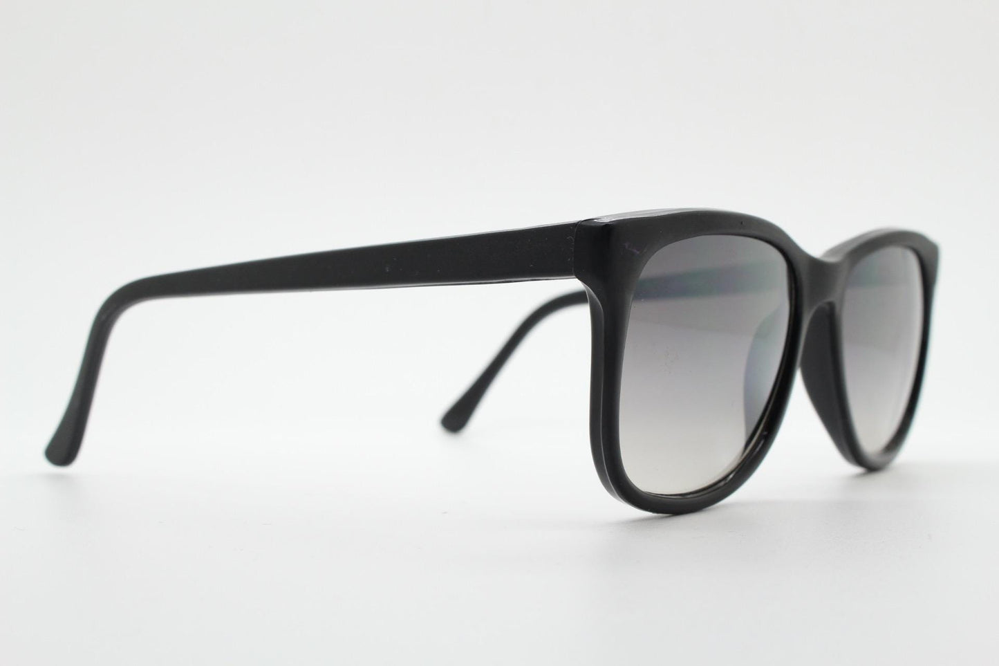 Vintage 80s thick frame black square sunglasses. All time classic design in matt and gloss combo with slight mirror glaze lenses. NOS