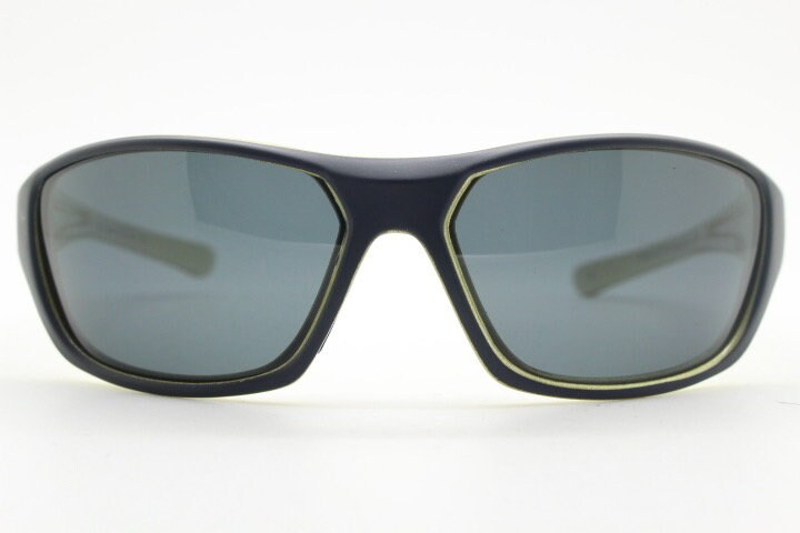 Y2K vintage sport shield sunglasses. All matt black wraparound aerodynamic visor with light green outline. 2000's. 90s. Unused NOS