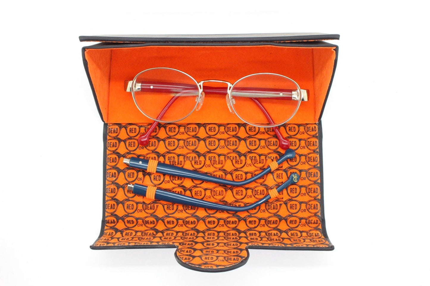 Red or Dead Y2K vintage oval eye glasses. Green or red interchangeable arms on a chrome metal frame. Optical prescription eyeglasses. RX