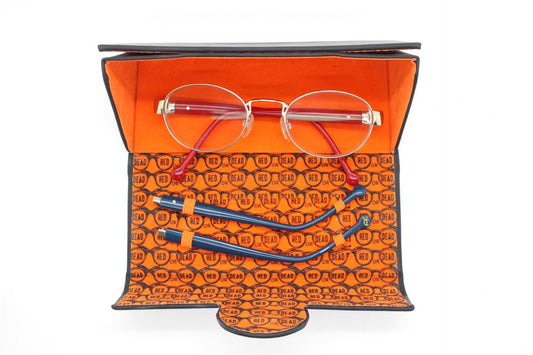 Red or Dead Y2K vintage oval eye glasses. Green or red interchangeable arms on a chrome metal frame. Optical prescription eyeglasses. RX