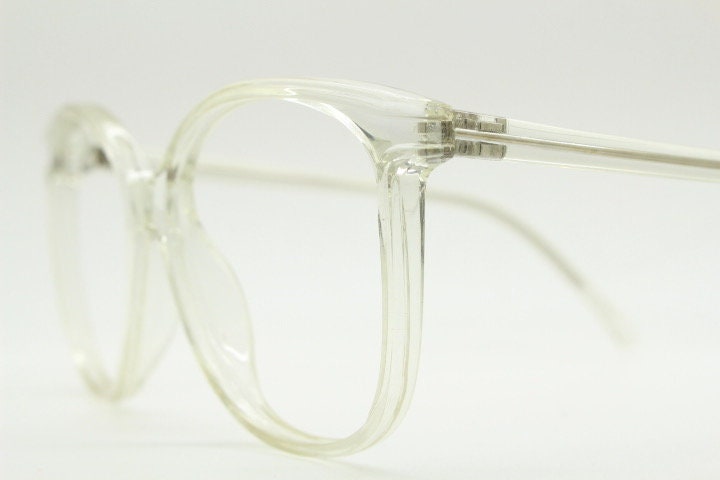 80s vintage oversized round cat eye glasses. Transparent clear crystal optical frame. Prescription RX spectacles. Clean NOS cateye
