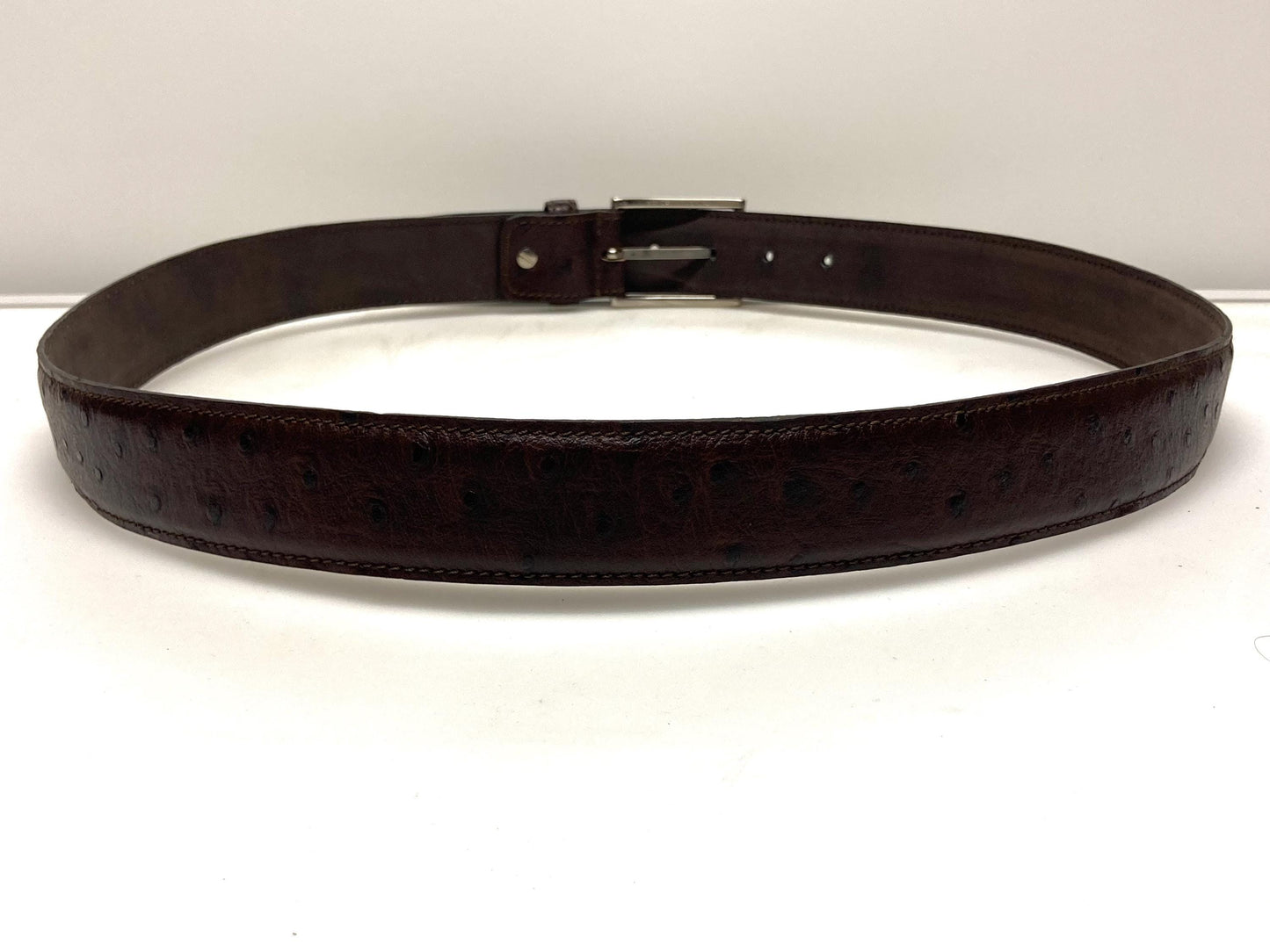90s vintage dark brown genuine leather belt made in Italy by Joseph Di Pino. Tooled finish made to look like Ostrich. NOS. Mens Large