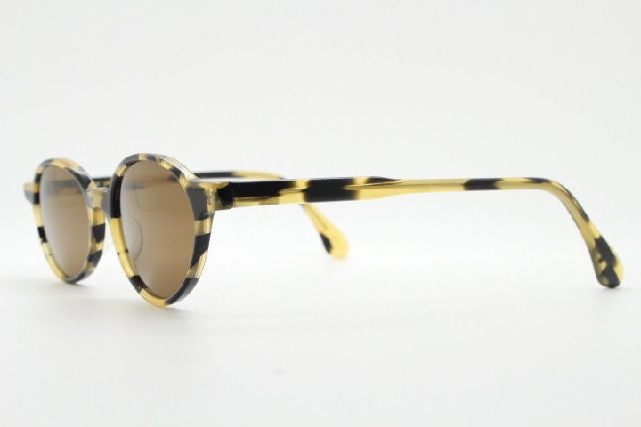 Robert La Roche 90s vintage oval sunglasses. Vibrant honey and mottled brown acetate undersized frame with plain brown lenses. NOS