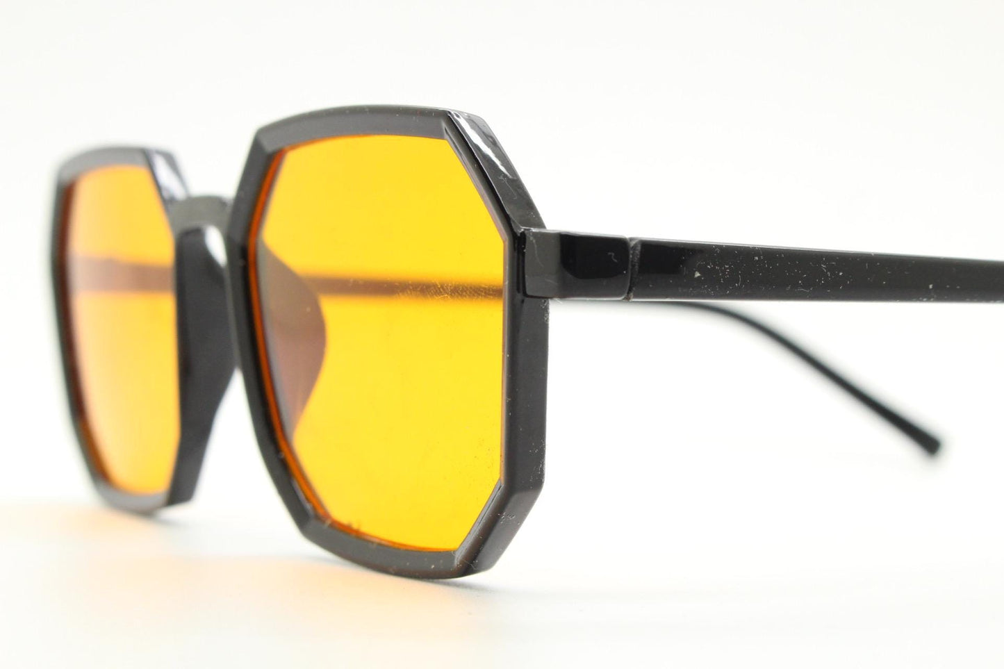 Vintage octagon sunglasses. Well proportioned subtle 8 sided black gloss frame with intense orange lenses. Rave. BNWT. NOS