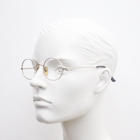 Giorgio Armani 90s vintage oval eye glasses made in Italy. 30s design gold optical frames in a satin finish. Prescription RX