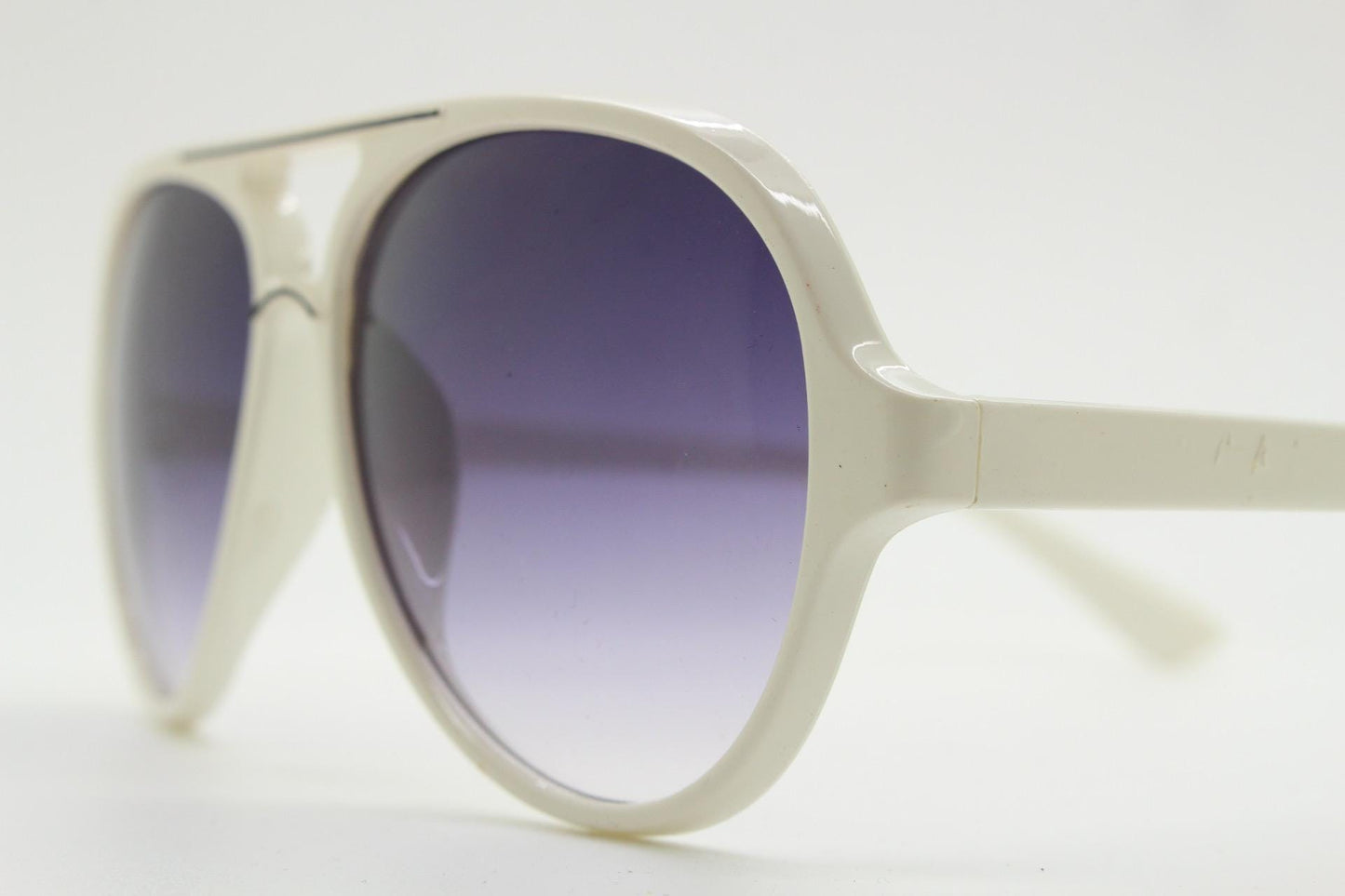 Y2K vintage teardrop aviator sunglasses. 2000's ice white frame with graduating black lenses and bridge outline. 80s design NOS aviators