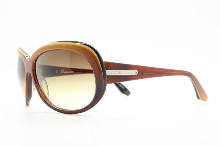 Dita oversized 70s design sunglasses model Pretender made in Japan. Gorgeous brown and black layered acetate. Womens NOS. 60s