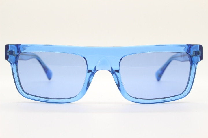 Kaleos rectangular flat top sunglasses. Bright sky blue acetate chunky frame with same colour lenses. BNWOT