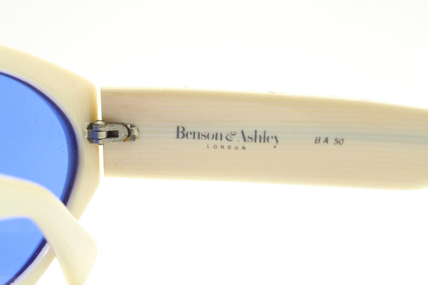 Benson and Ashley vintage 80s cat eye sunglasses hand made in England. 50s design white acetate cateye frame with cobalt blue lenses. NOS
