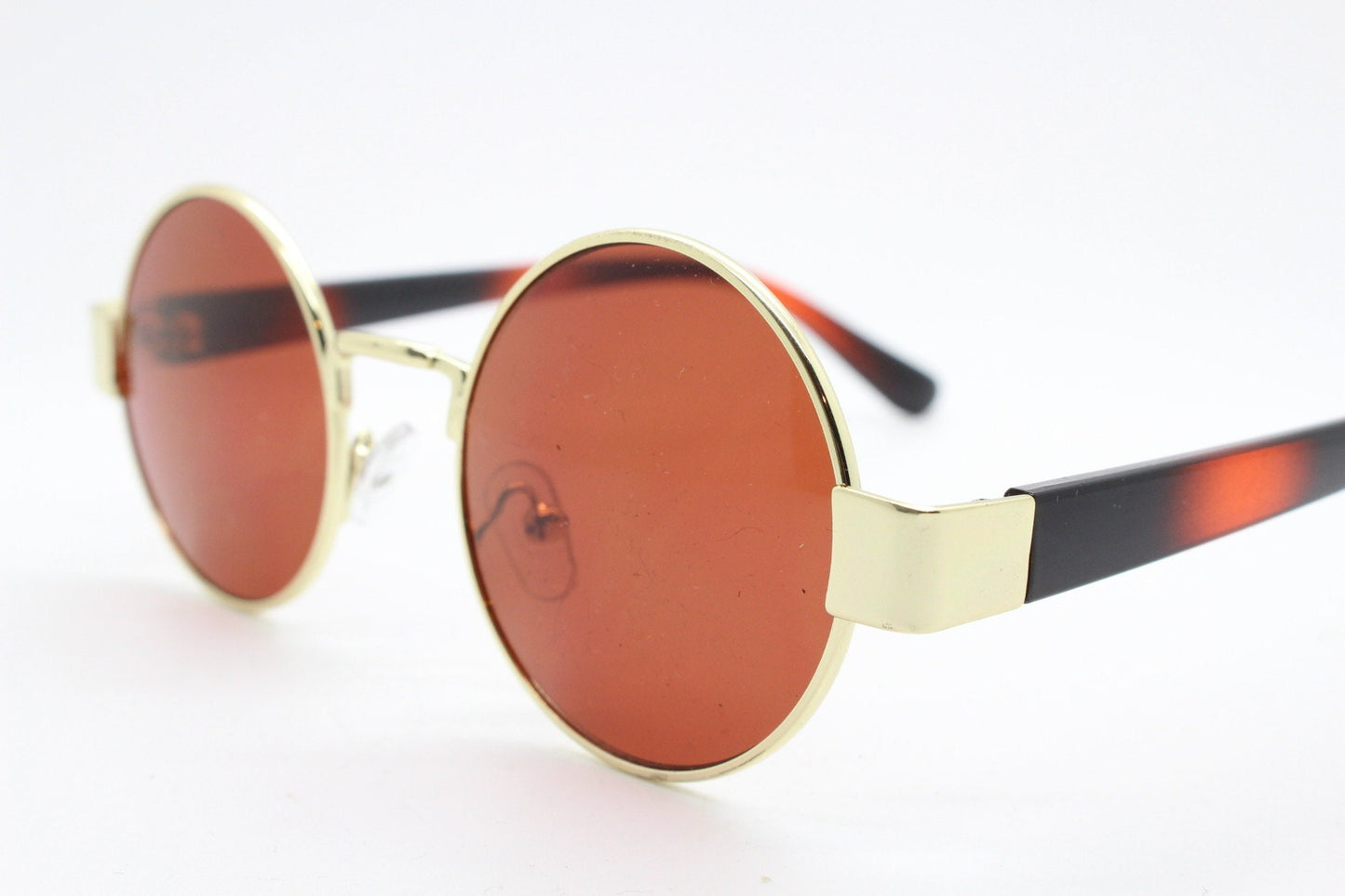 90s round vintage sunglasses. Gold 1920's style frame with tiger pattern arms and brown lenses. Unused. BNWT