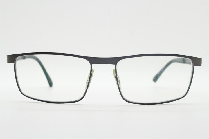 Porsche design rectangular eye glasses model 8251 made in Japan. Minimal gunmetal grey wire optical frame. Prescription RX spectacles