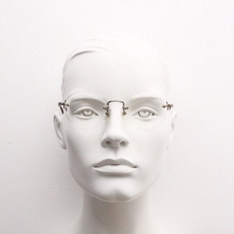 Edwin vintage 90s frameless round eye glasses model 59392A made in Japan. Minimal satin bronze finish optical frame. Prescription RX