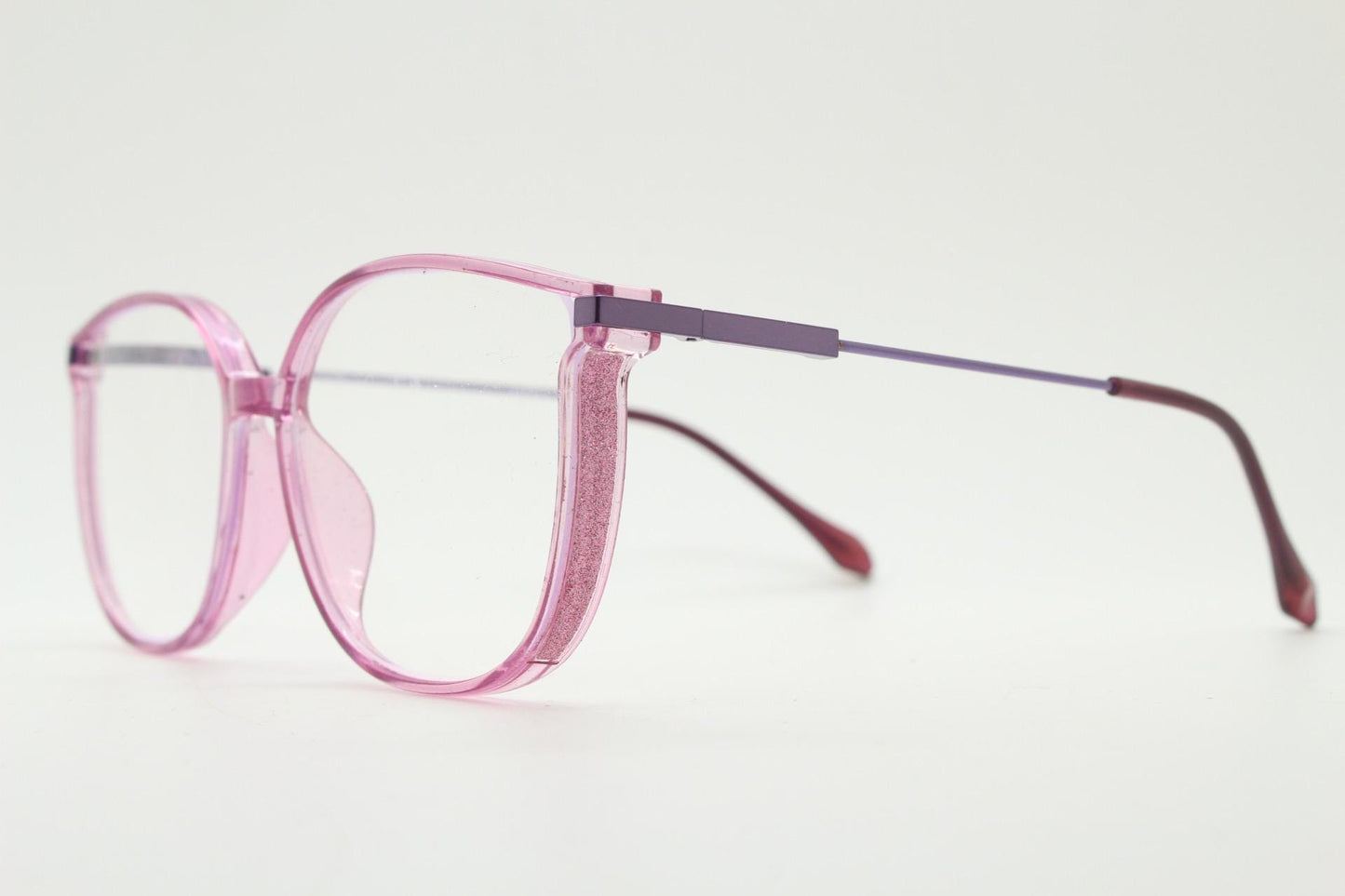 Round cat eye glasses. Transparent pink cateye optical frame with purple metal arms and eyecatching glitter sides. Vintage Prescription RX