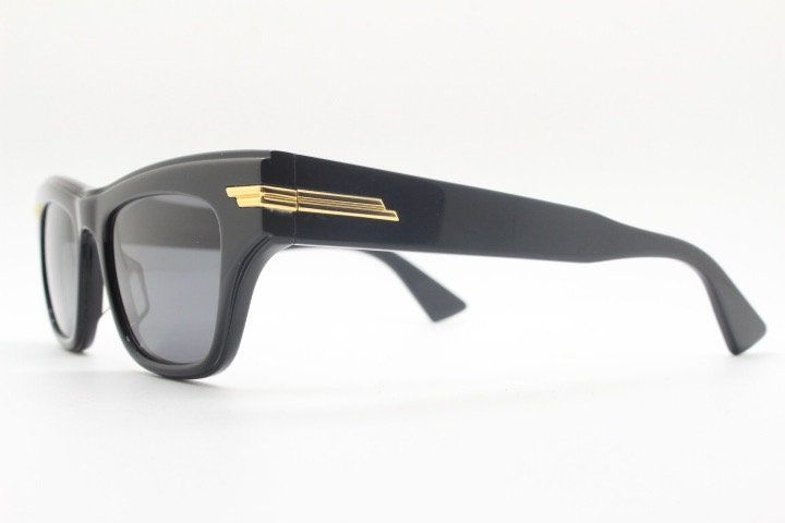 Bottega Veneta thick flat top cat eye sunglasses made in Japan. Black gloss acetate frame with sharp cropped sides. Womens cateye. BNWOT
