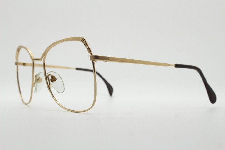 Silhouette 70s vintage eye glasses made in Austria. Womens sophisticated oversized angular gold optical frame. Prescription eyeglasses. Rx