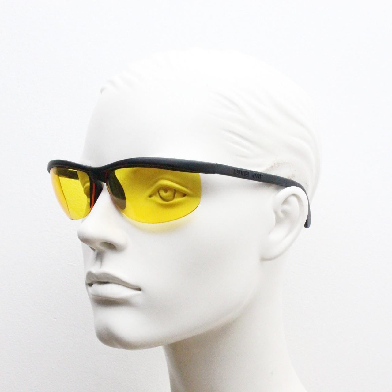 90s vintage half frame shield sunglasses. Thick matt black wrap around brow with intense orange bug eye lenses. Rave fashion grail. NOS