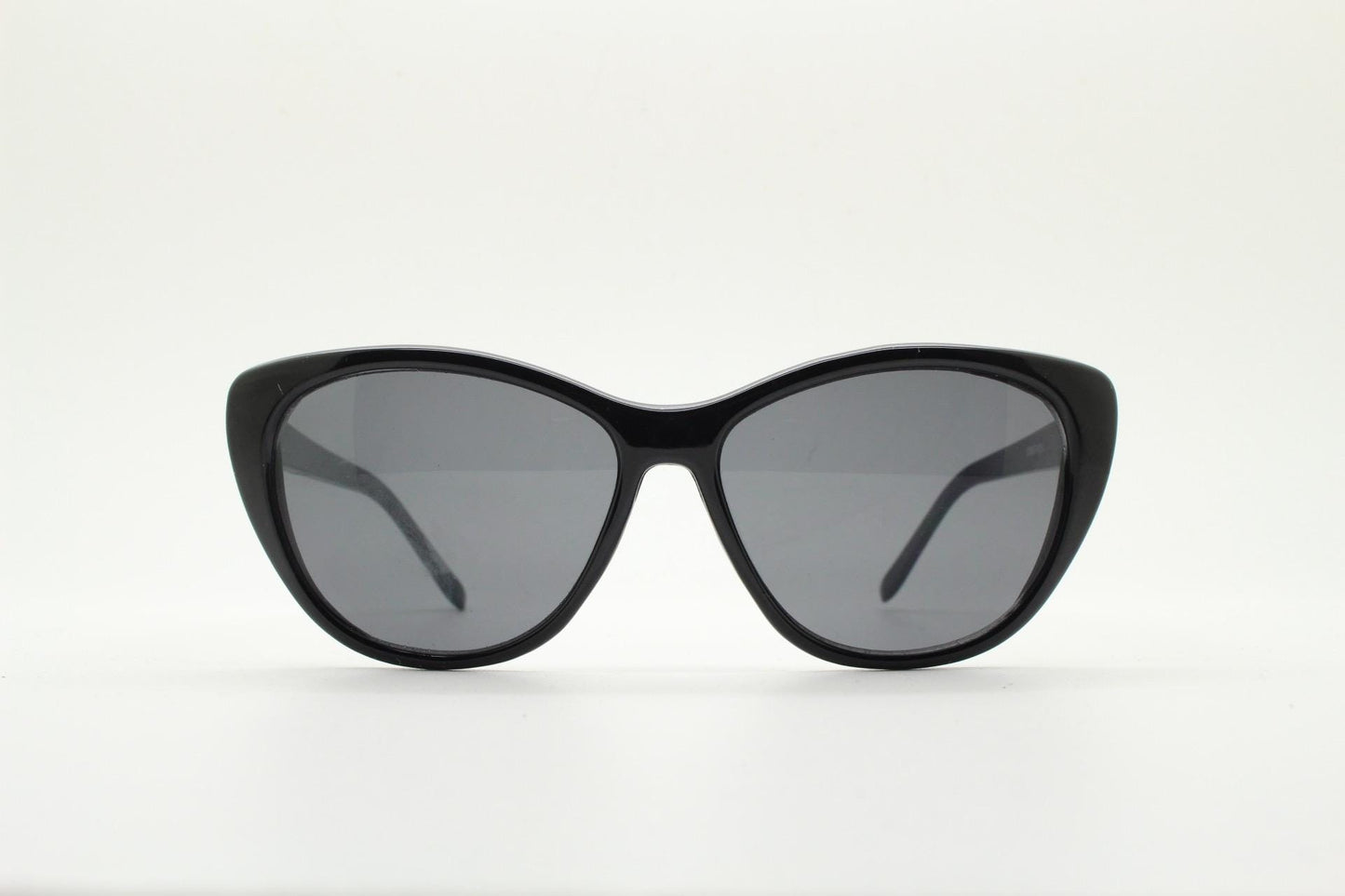 Vintage Y2K oval cat eye sunglasses. Womens plain black cateye in slightly large proportions. Rockabilly pin up. 2000s NOS catseye