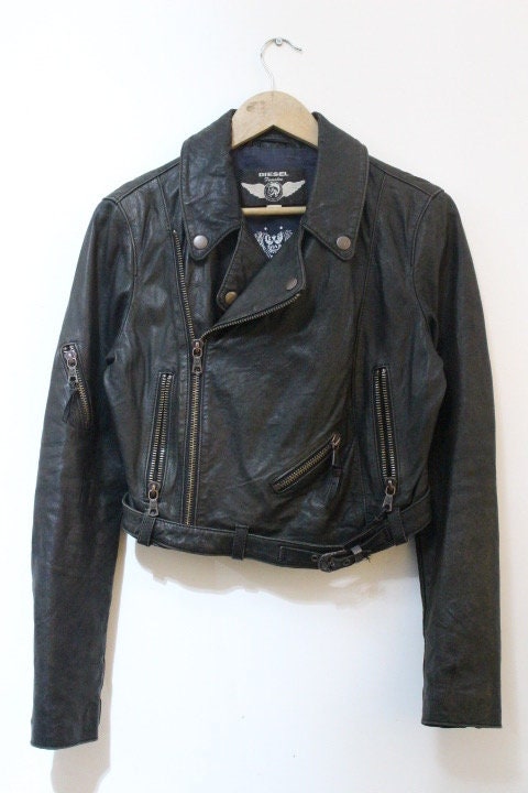 Diesel black fitted womens motorcycle jacket. Genuine leather cropped biker design with fixed adjustable belt. Over 30% sale rrp 469 GBP