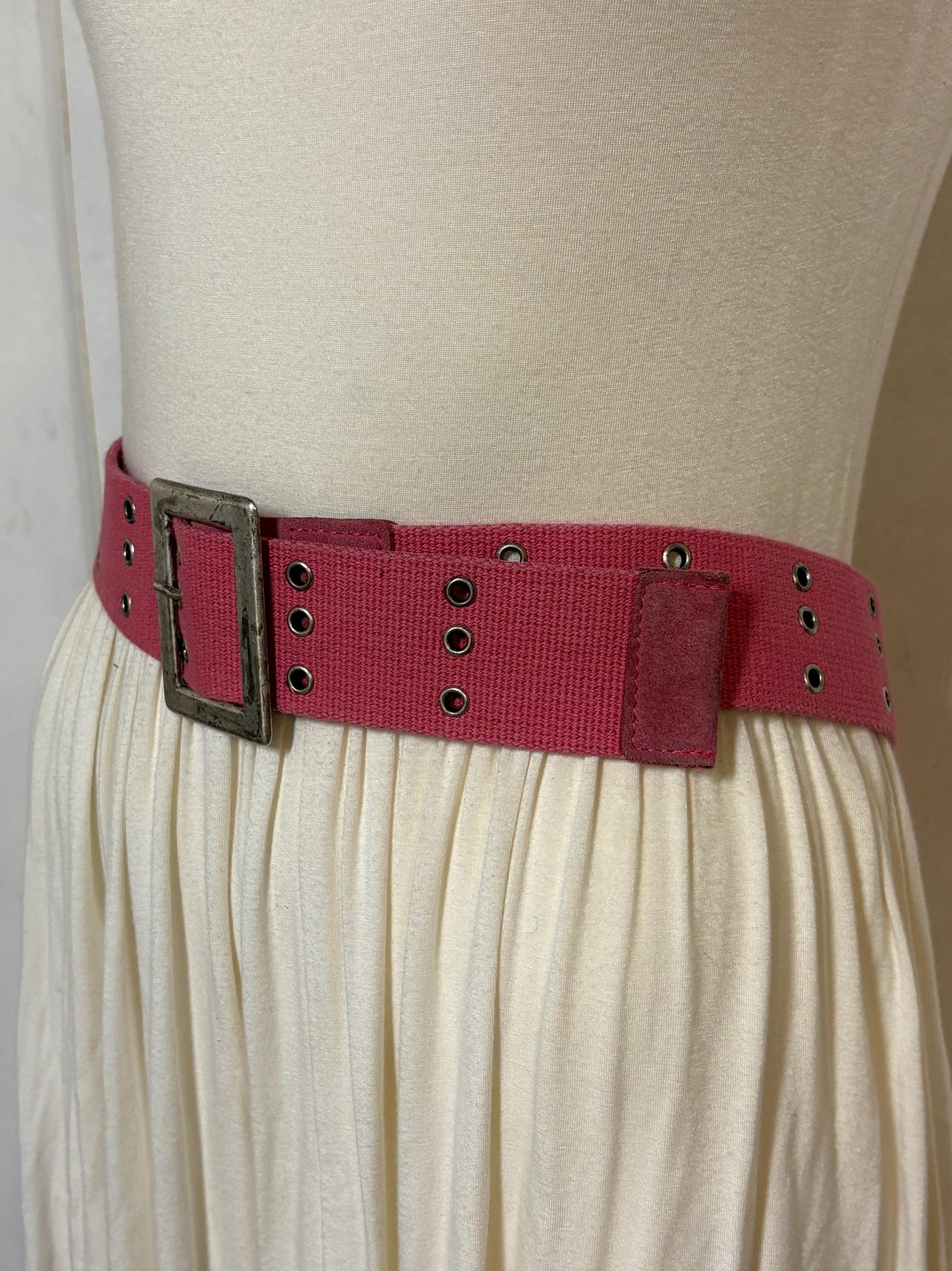 Y2k vintage thick candy pink army style belt with distressed metal buckle and 3 rows of lace holes. Statement feature / to cinch a dress