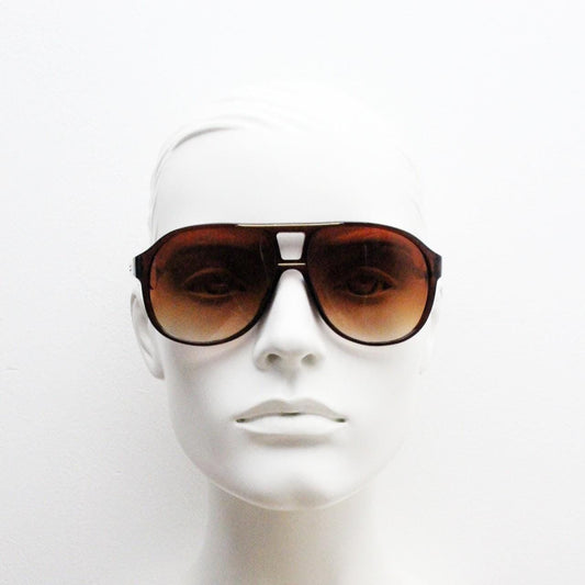 Y2K vintage aviator sunglasses. 2000's transparent brown frame with graduating lenses and gold detail. 70s design. 00's NOS aviators