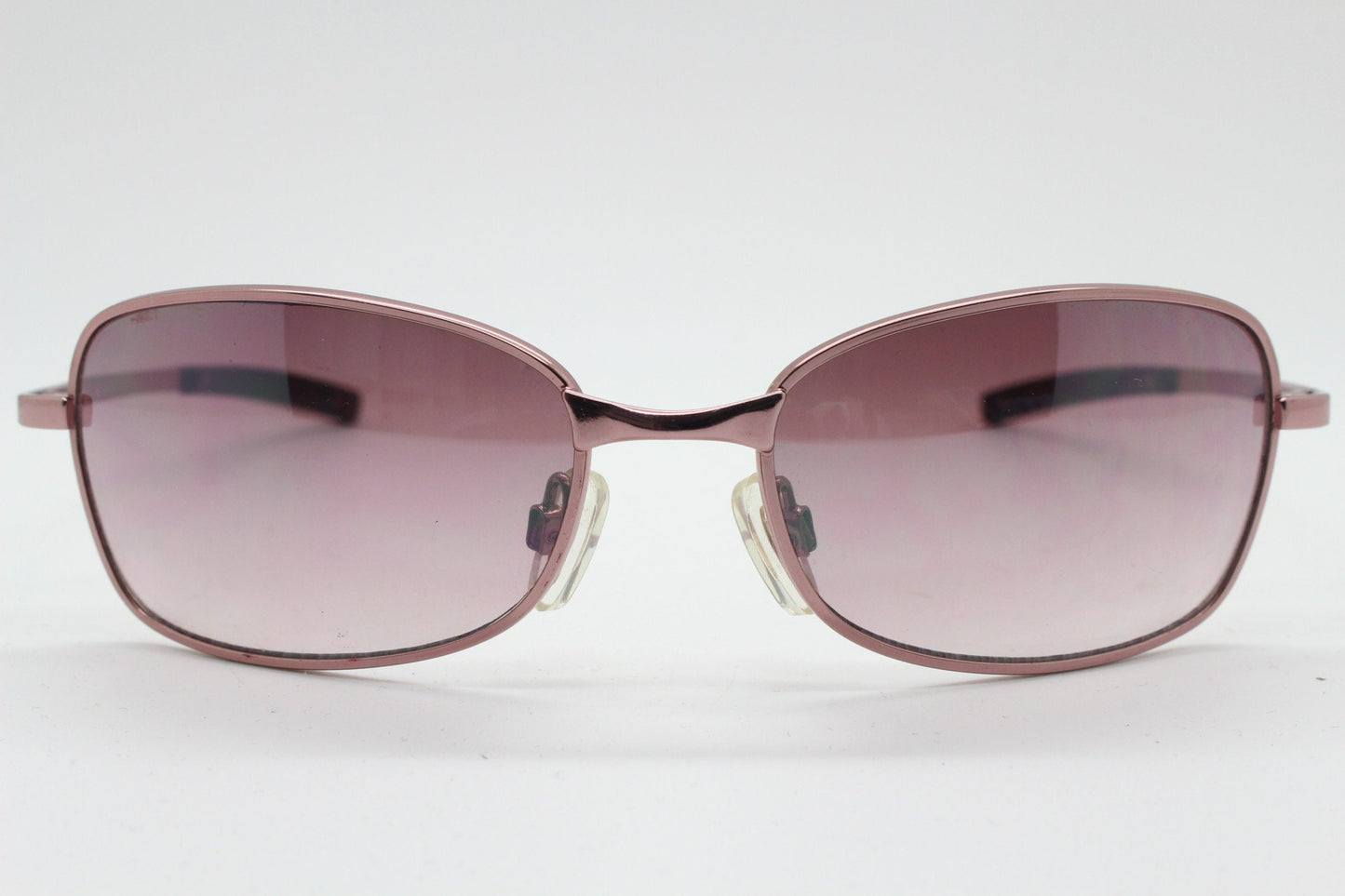 Y2K vintage curved sunglasses. Unusual Pink chrome metal frame with matching flared rectangular lenses. Unused 2000s NOS