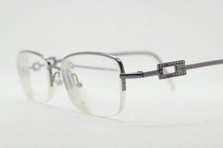 Gucci rectangular eye glasses made in Italy. Slim metal wire low profile optical half frame with diamante logo. Prescription eyeglasses. RX