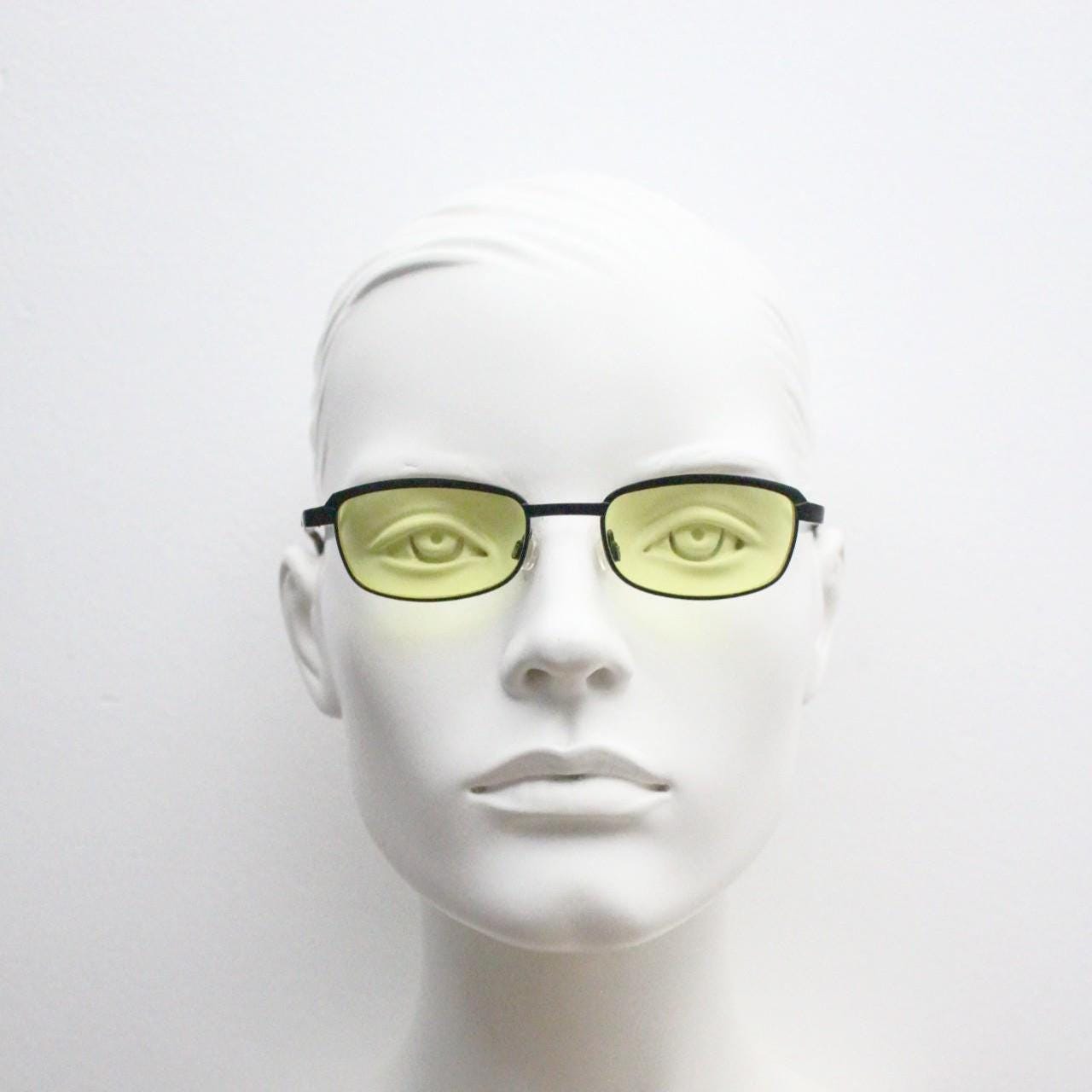 Vintage small rectangular sunglasses. Authentic quirky 90s design in a matt black solid metal frame with bright yellow lenses. 2000s. NOS