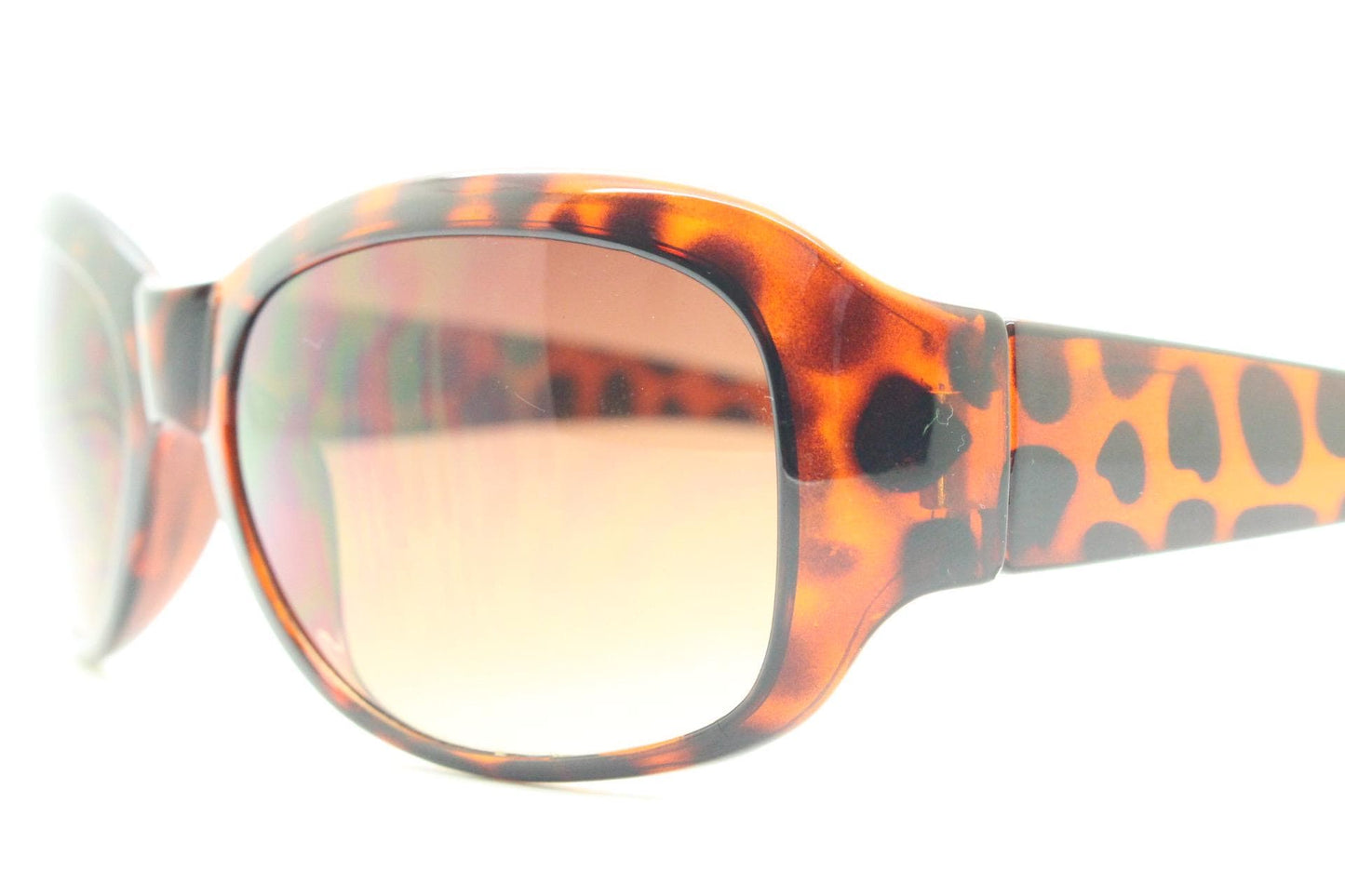 Y2k vintage wrap around bug eye sunglasses. Curved tortoise gloss frame with gradient Havana brown lenses. 2000's NOS