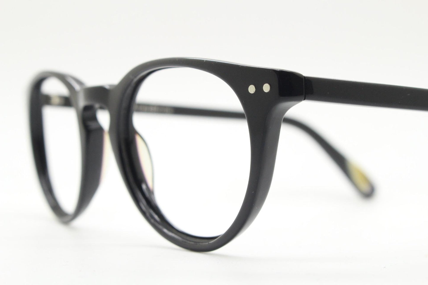 90s vintage oval eye glasses by Alles Brille of Germany. Classical black gloss acetate optical frames with keyhole bridge. RX Spectacles