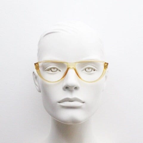 Christian Dior 80s vintage flat top cat eye glasses made in Germany. Transparent yellow optical frame with abstract print. Prescription RX