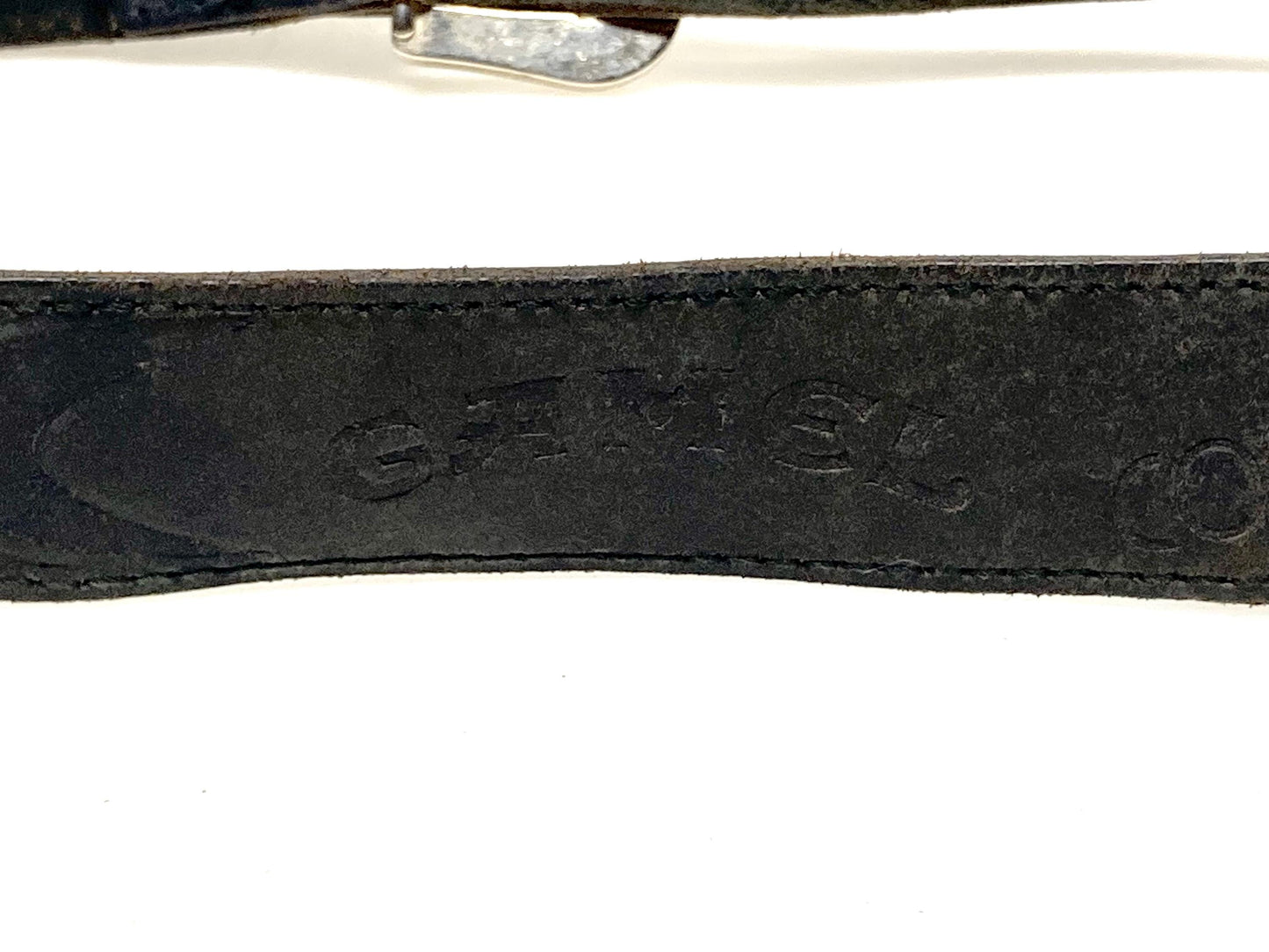70s vintage black thick genuine leather belt with silver buckle by Camel. Subtle embossed patterns and big logo. For jeans and trousers