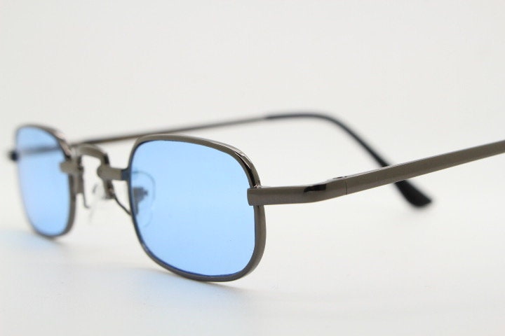 90s vintage small rectangular sunglasses. Imposing minimal gunmetal grey victorian style frame with sky blue lenses. Steampunk. Unused NOS