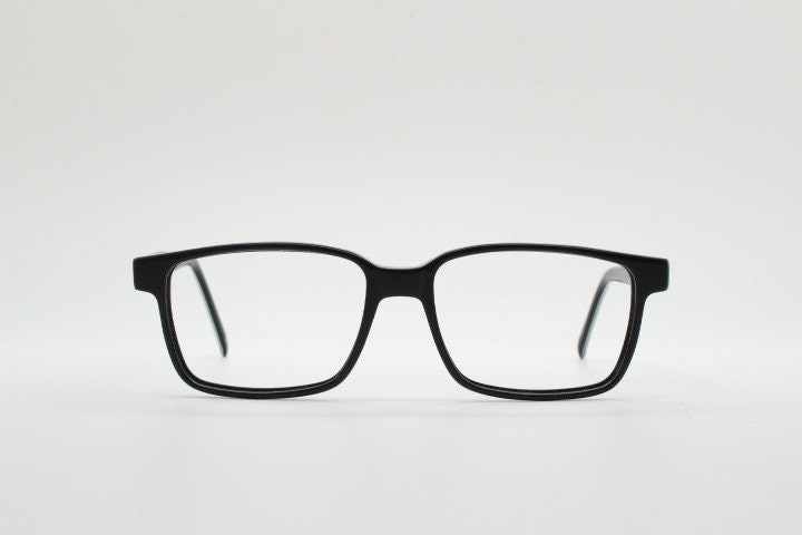 Carrera rectangular eye glasses. Black and white layered acetate optical frames. Prescription eyeglasses. Vintage RX spectacles