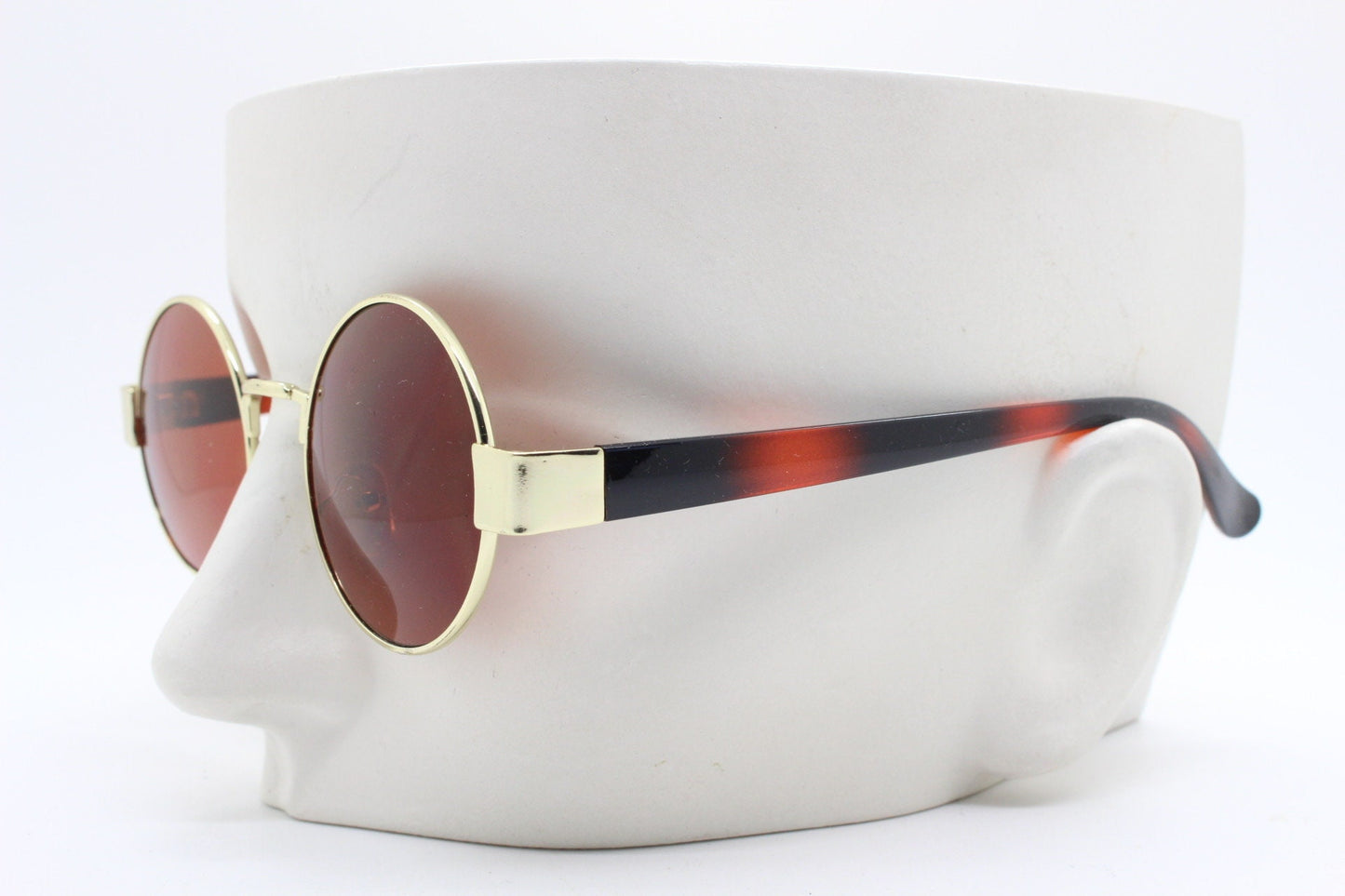 90s round vintage sunglasses. Gold 1920's style frame with tiger pattern arms and brown lenses. Unused. BNWT