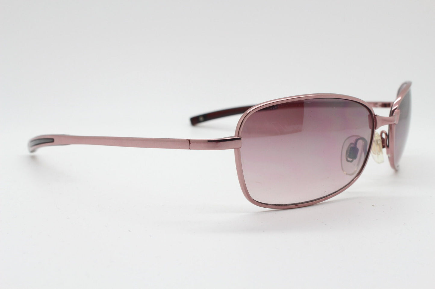 Y2K vintage curved sunglasses. Unusual Pink chrome metal frame with matching flared rectangular lenses. Unused 2000s NOS