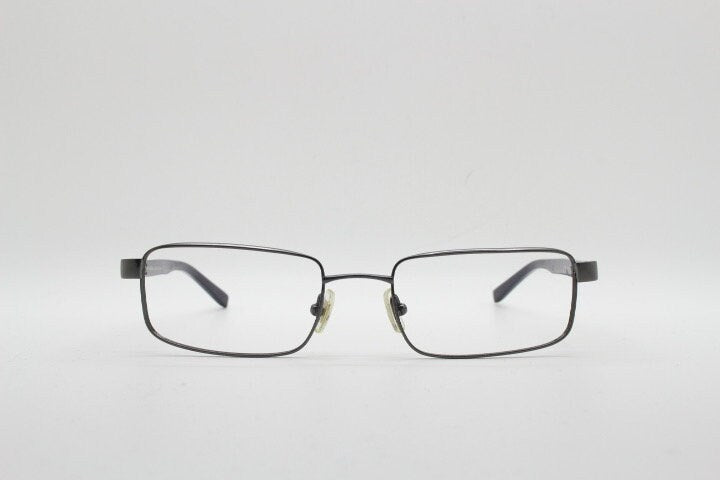 Calvin Klein collection rectangular eye glasses model 582 made in Japan. Gunmetal grey wire optical frames. Prescription eyeglasses. RX