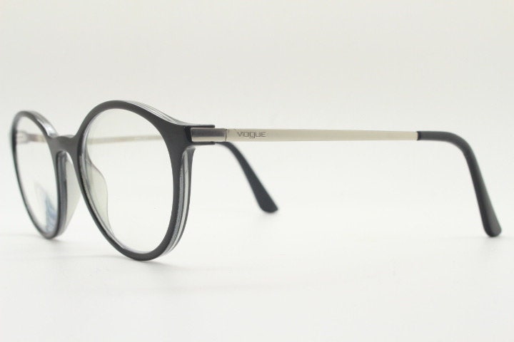 Vogue womens oval eye glasses model 5223. Black acetate optical frames with metal arms. Prescription eyeglasses. RX spectacles