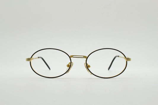 90s vintage small oval eye glasses. Gold and black optical frames with ornate arm details. Prescription RX steampunk spectacles. NOS