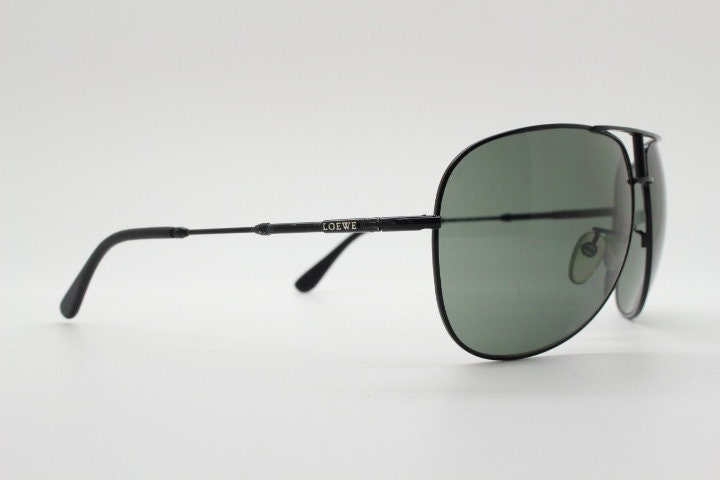 Loewe vintage aviator sunglasses in a tall black gloss frame with dark green lenses. Mens large teardrop pilot aviators. Y2K New Old Stock