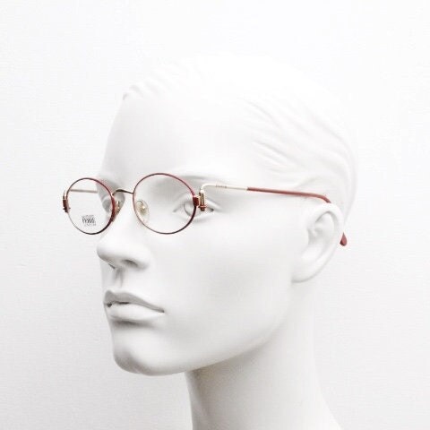 Gianfranco Ferre 90s vintage oval eye glasses made in Italy. Red and gold metal tech design optical frame. Prescription RX. NOS