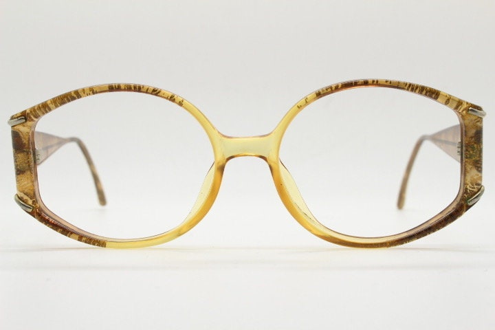 Christian Dior 70s vintage round eye glasses. Transparent honey colour optical frame with abstract gold sparkle patterns. Prescription RX