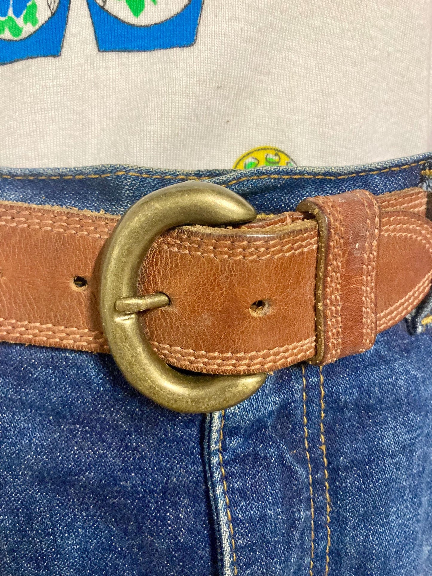 80s vintage jeans or trousers belt with brass buckle. Tan brown substantial single cut genuine leather construction with triple stitching