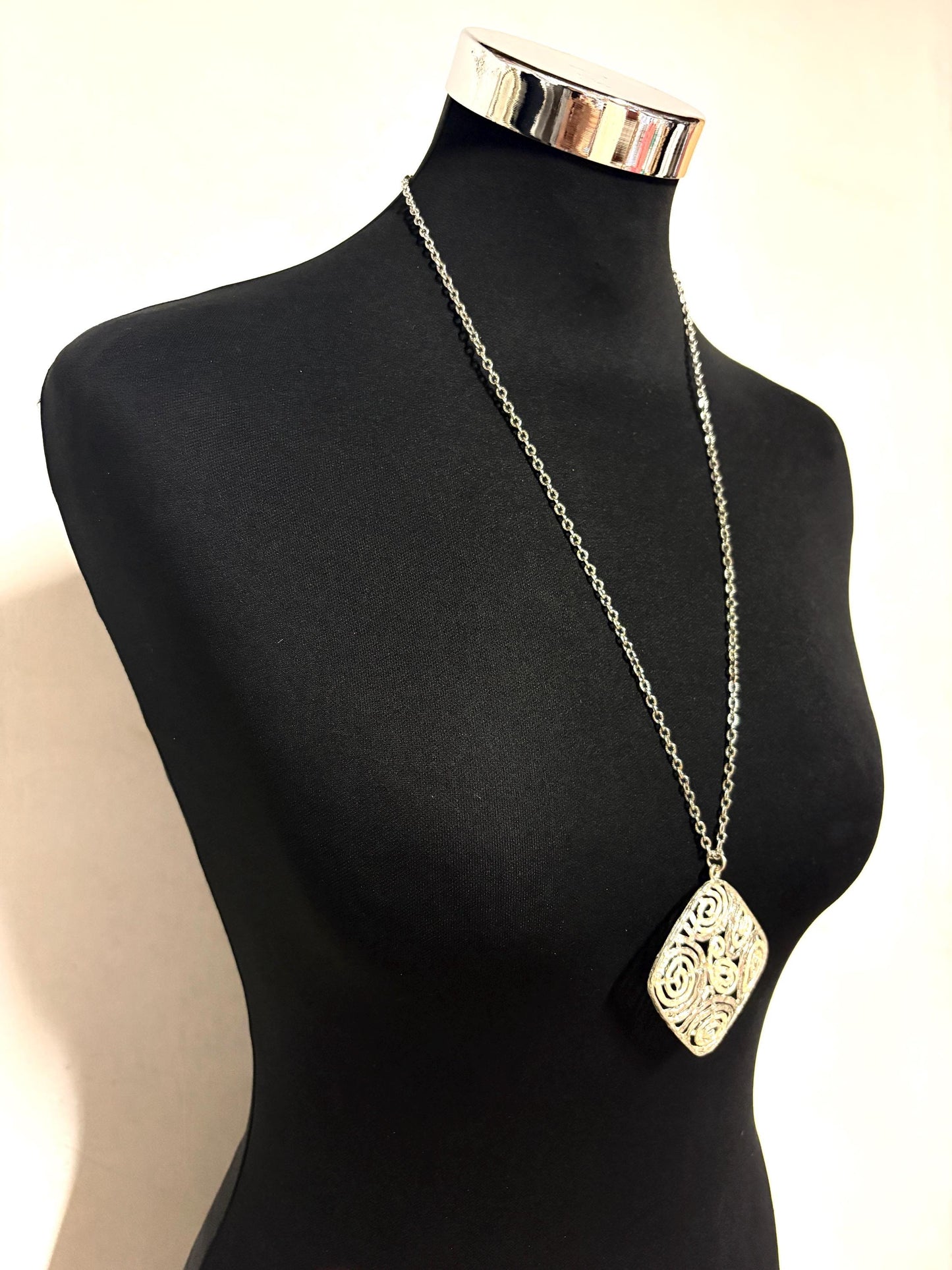 60s vintage large silver square pendant necklace made in England. Satin and matt finish with swirling paisley cut out shapes. Womens. NOS