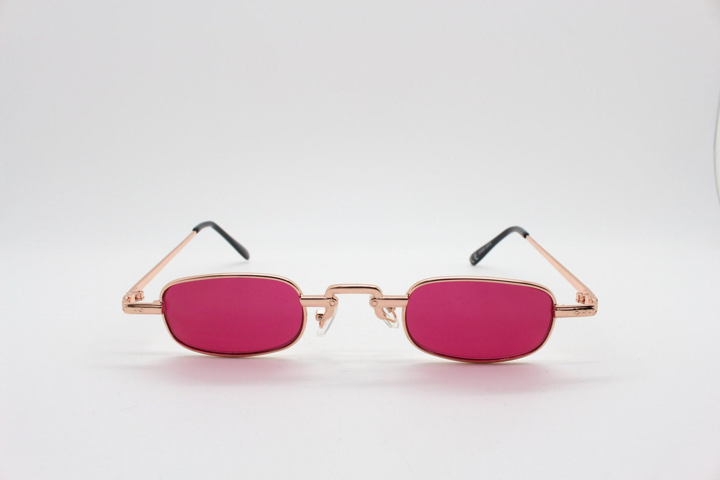 90s vintage small rectangular sunglasses. Imposing minimal gold metal victorian design frame with shocking pink lenses. Unused BNWT