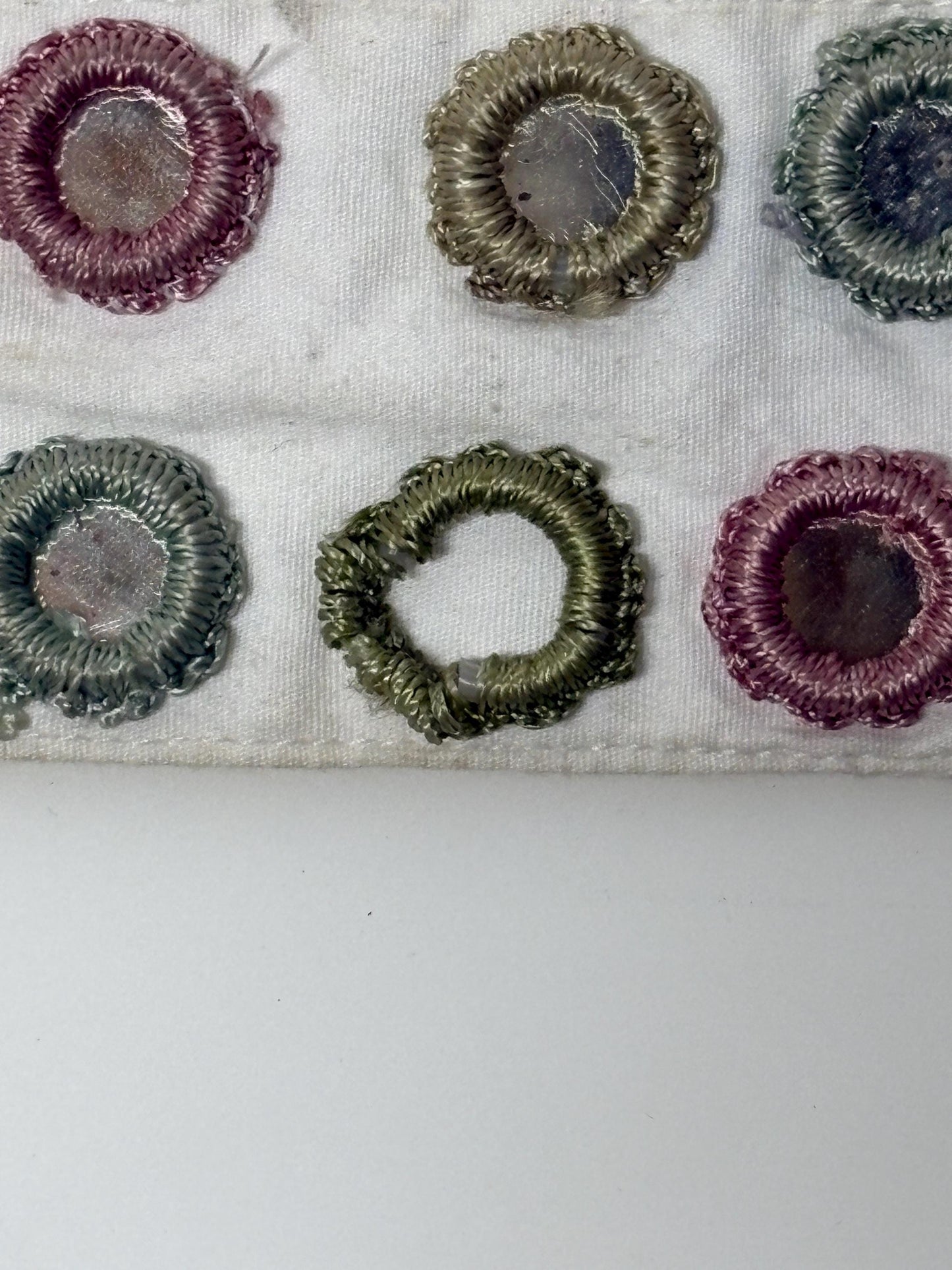 Y2K vintage womens dress belt by Stephanie Hirsch. White with pink and green embroidered little frames around mirror circles. 2000s. BNWT